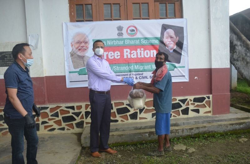 DC Tuensang Kumar Ramnikant distributing ANB free ration to stranded workers at Tuensang on July 2. (DIPR Photo)